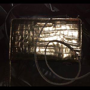Michael Kors gold clutch